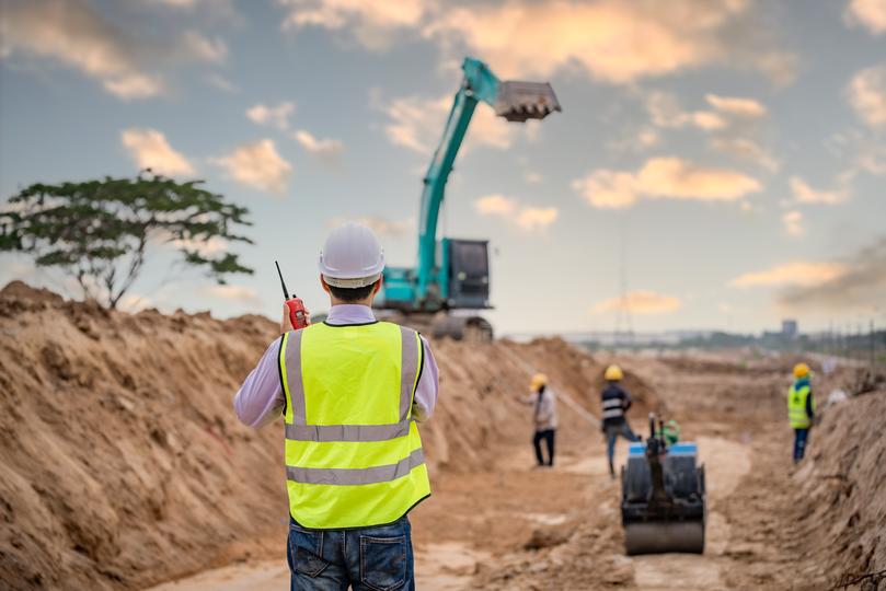 Construction workers building a new house