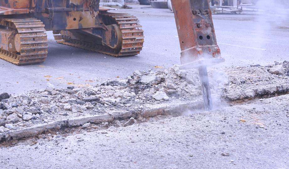 A demolition crew safely dismantling a building