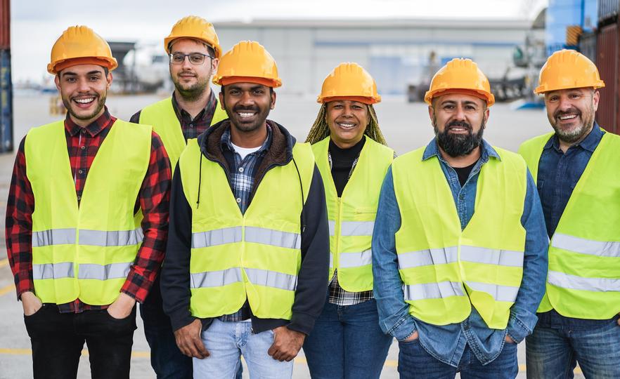 Construction workers building a new house